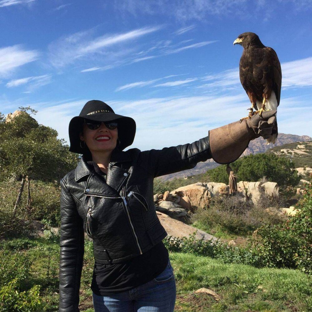 Becky Kay holding falcon